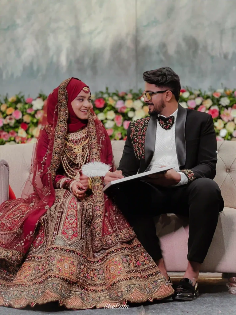 best wedding photography in calicut captured a couple sitting on a stage