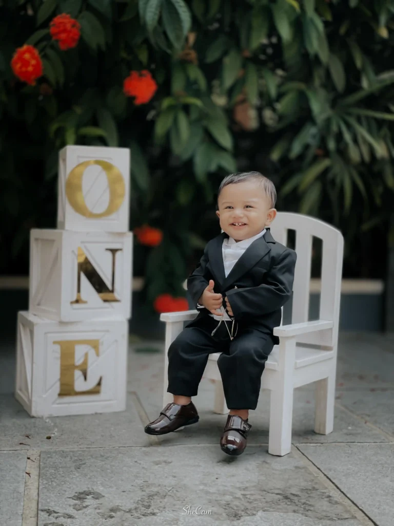Professional baby pre birthday photoshoot in Calicut with creative themes and setups.